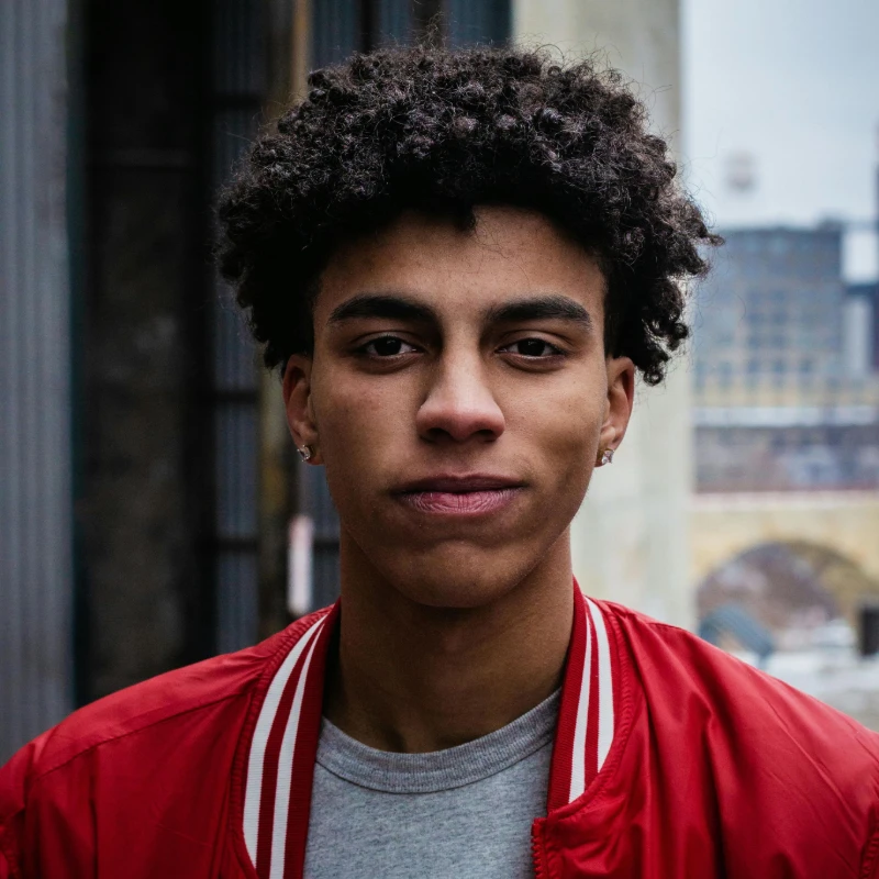 portrait of a man wearing red jacket