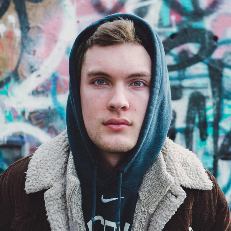 a man portrait with graffiti background