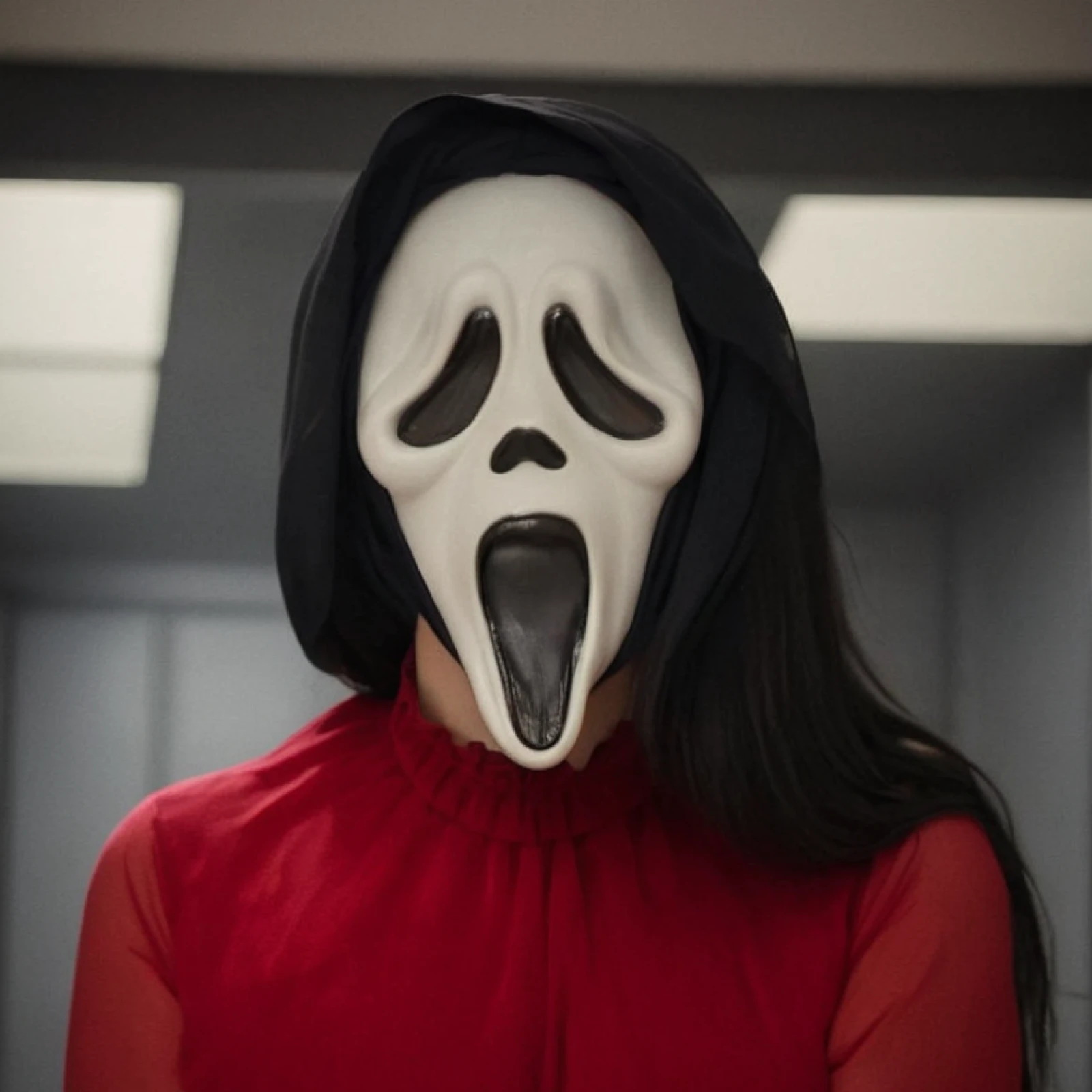 a woman wears red clothes in ghost filter