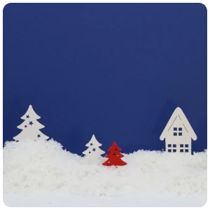 a snow ground background with white and red christmas trees