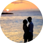 round avatar of a couple in the sunset